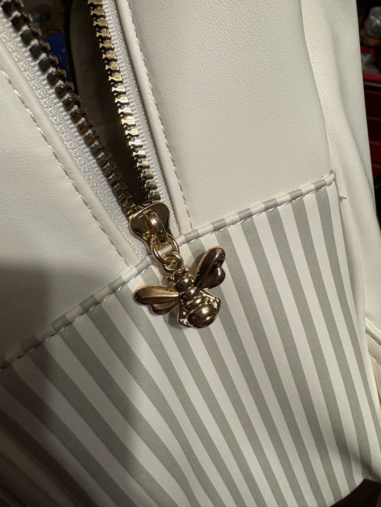 Primark Winnie the Pooh Cream Mini Backpack.  Brand new with tags